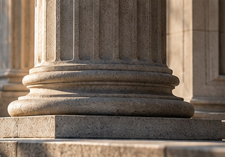 Illustrative image of a stone column base in afternoon light